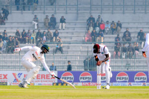 Pakistan's Muhammad Rizwan plays a shot during the second day of the first Test cricket match between Pakistan and West Indies at the Multan Cricket Stadium