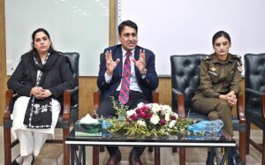 Jawad Hussain Malik, Assistant Commissioner Rawalpindi speaks during CSS Officers Panel Discussion organized by Quaidian Counseling & Opportunity Club at Quaid-e-Azam University.
