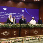Prime Minister Muhammad Shehbaz Sharif along with other delegates stands in honor of the national anthem during the International Conference on Girls' Education 2025 at Jinnah Convention Centre