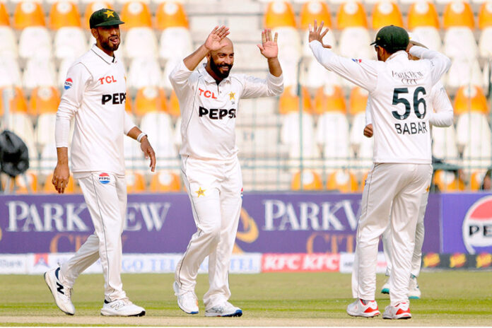 Pakistan's Sajid Khan celebrates after taking the wicket of West Indies' Mikyle Louis during the second day of the first Test cricket match between Pakistan and West Indies at the Multan Cricket Stadium