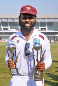 West Indies' Jomel Warrican receiving Player of the Series Award during prize distribution ceremony after third day of the second Test cricket match between Pakistan and West Indies at the Multan Cricket Stadium.