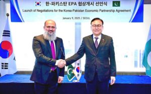 Cricket enthusiasts enjoying a friendly match, adding liveliness to a winter day near the serene Chenab River at Head Muhammad Wala.