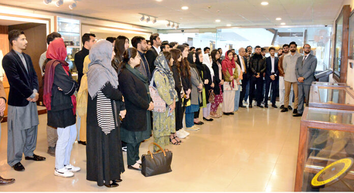 Students and faculty members of Quaid-I-Azam University, Islamabad visiting Senate Museum at Parliament House in federal capital