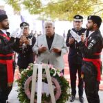 Chairman Federal Board of Revenue Rashid Mahmood Langrial offers Fateha at the monument of martyrs in the ceremony held to mark International Customs Day at the Customs House Karachi