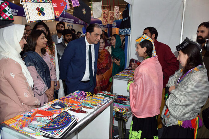 Federal Secretary of Commerce, Jawad Paul Khawaja, visits stalls at the 12th WEXNET Exhibition 2025 at Expo Centre Johar Town, organized by the Trade Development Authority of Pakistan