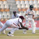 West Indies' Justin Greaves takes a catch to dismiss Pakistan's Saud Shakeel during the third day of the first Test cricket match between Pakistan and West Indies at the Multan Cricket Stadium