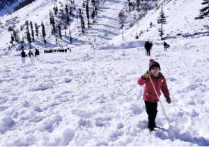 Tourists enjoying a day on snow at Panjota Picnic Point during their visit