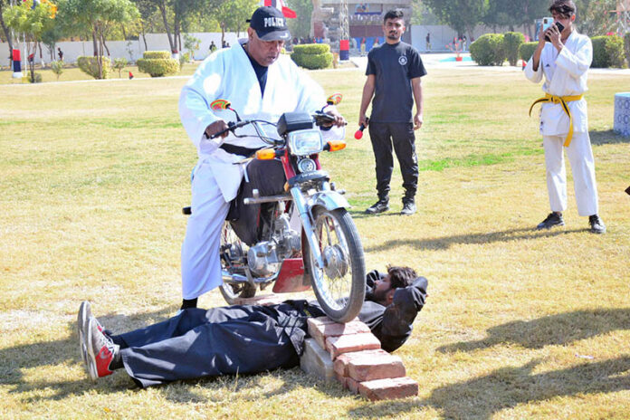 Pass out constables are showing their skills during the Passing out parade of recruit course batch 26th at police training center at Kohsar
