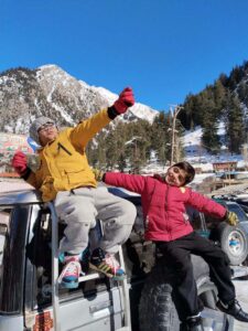 Tourists enjoying a day on snow at Panjota Picnic Point during their visit