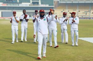 West Indies' Justin Greaves takes a catch to dismiss Pakistan's Saud Shakeel during the third day of the first Test cricket match between Pakistan and West Indies at the Multan Cricket Stadium