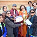 Regional Director Colleges Professor Altaf Hussain Abro along with Principal Begum Nusrat Bhutto Government Girls Degree College, Prof. Samina Naz Abro and others giving away winner trophy of Throw Ball competition during Annual Sports Day at BNB Girls College
