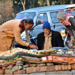 People busy purchasing dry fruits from vendor at Jail Road