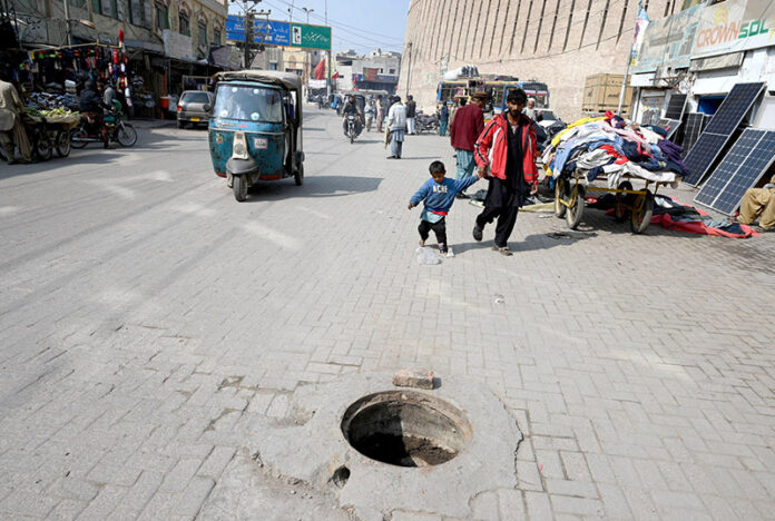A view of open the main hole at station road need the attention of concerned authorities