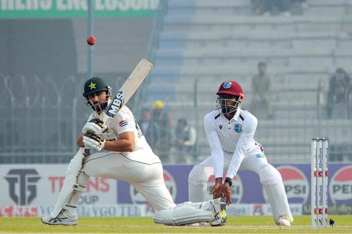 Pakistan's Salman Ali Agha plays a shot during the third day of the first Test cricket match between Pakistan and West Indies at the Multan Cricket Stadium