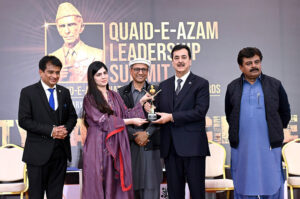 Chairman Senate Syed Yousuf Raza Gillani presents the Quaid-e-Azam National Leadership Awards to the participant during the Leadership Summit, joined by Chairman Youth Parliament Rizwan Jaffar and Sindh Ministers Saeed Ghani and Syed Sardar Ali Shah in the provincial capital