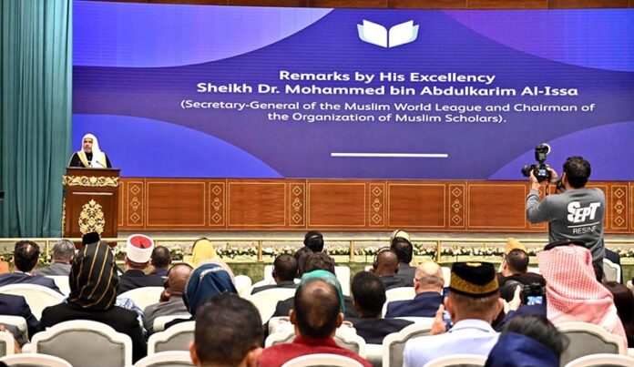 Secretary General of the Muslim World League, Sheikh Dr. Mohammed bin Abdulkarim al-Issa addresses the closing ceremony of the International Conference on Girls' Education at Jinnah Convention Centre
