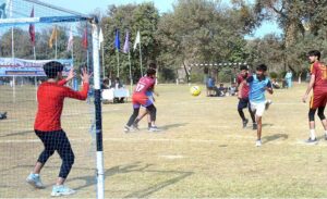 A goalkeeper stops the ball during a handball match between the Faisalabad Board and the Peshawar Board at the Pakistan Inter Board Handball Championship at BISE Ground in the city.