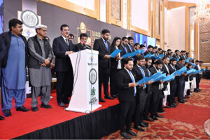 Chairman Senate Syed Yousuf Raza Gillani, administers the oath to Youth Parliament members during the Quaid-e-Azam Leadership Summit & National Leadership Awards at a local hotel in the provincial capital