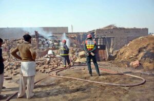 A view of dead livestock at the incident site amidst the debris of destroyed houses after a liquefied petroleum gas (LPG) tanker truck exploded near an industrial area.