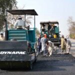 NHA workers with the help of modern and heavy machinery repairing the Motorway Road to make the journey comfortable for commuters
