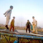 Youngsters enjoy jumping on trampoline