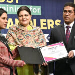 Director General Food Authority, Asim Javed is distributing certificates among the female students at a training ceremony organized by the Food Authority Department on the importance of nutrition for girls at Kinnaird College