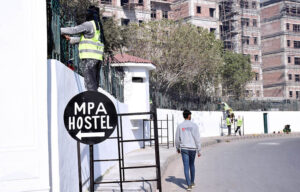 Labourers busy in construction work of MPA Hostel Punjab Assembly