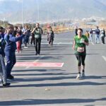 A woman reached the finishing line as a large number of people participated in the Islamabad Marathon 2025 organized by “Islamabad Run with Us