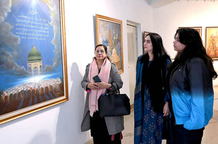 Women immerse themselves in the beauty of Sufism through art at a captivating painting exhibition held at Al-Hammar Hall