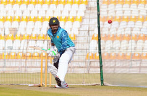 Pakistan's Muhammad Rizwan warming up before a practice session at Multan Cricket Stadium, ahead of their first Test cricket match against the West Indies.