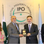Chairperson Ambassador (R) Farukh Amil presenting shield to Turkish Ambassador H.E Irfan Neziroglu during his visit at the IPO Headquarters