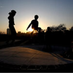 Children enjoy jumping on trampoline near G-7 in the Federal Capital
