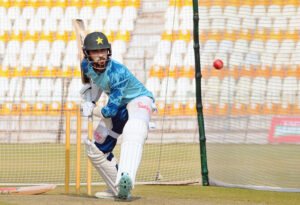 Pakistan's Muhammad Rizwan warming up before a practice session at Multan Cricket Stadium, ahead of their first Test cricket match against the West Indies.