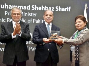 Prime Minister Muhammad Shehbaz Sharif receives a souvenir from Chairperson PSE Ms. Shamshad Akhtar during his visit to Pakistan Stock Exchange