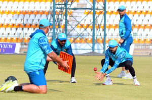 Pakistan's Muhammad Rizwan warming up before a practice session at Multan Cricket Stadium, ahead of their first Test cricket match against the West Indies.