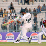 Pakistan's captain Shan Masood plays a shot during the second day of the first Test cricket match between Pakistan and West Indies at the Multan Cricket Stadium