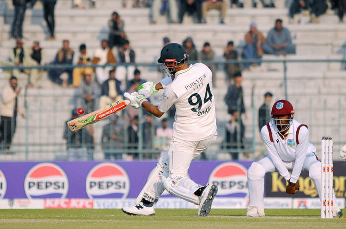 Pakistan's captain Shan Masood plays a shot during the second day of the first Test cricket match between Pakistan and West Indies at the Multan Cricket Stadium