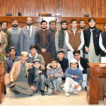 Group photo of students and faculty members from Iqra Rauza Tulatfalsystem Akora Khattak, visiting Senate Hall at Parliament House