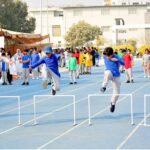 Students are participating in different games during annual Sports day of The City School at Public Sports Ground