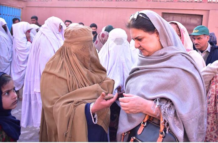 Chairperson Benazir Income Support Programme, Senator Rubina Khalid, listening to the concerns of BISP beneficiaries during her visit to the BISP Tehsil Office in Pabbi