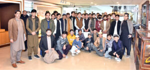 Group photo of students and faculty members from Iqra Rauza Tulatfalsystem Akora Khattak, visiting Senate Hall at Parliament House