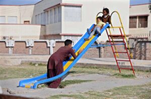Children enjoying in a local park Near Larkana- Moen-jo-Daro.