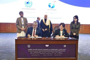 Secretary General of the Muslim World League, Sheikh Dr. Mohammed bin Abdulkarim al-Issa, witnesses Signing of International Partnership Agreements between Chairman HEC, Dr. Mukhtar Ahmed with Ms Dogdurkul Kendirbaeva, Minister of Education and Science Kyrgyzstan during Closing ceremony of the International Conference Girls Education at Jinnah convention Centre