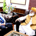 Senator Irfan-ul-Haq Siddiqui, spokesperson for the government negotiation committee, meets with JUI-F chief Maulana Fazlur Rehman at his residence