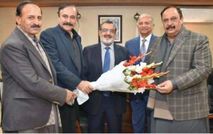Managing Director Pakistan Bait-ul-Mal (PBM) Senator Capt. Shaheen Khalid Butt receiving flower bouquet from Members of National Assembly, Tariq Fazal Chaudhry, Malik Ibrar Ahmed and Anjum Aqeel Khan at PBM Head office.