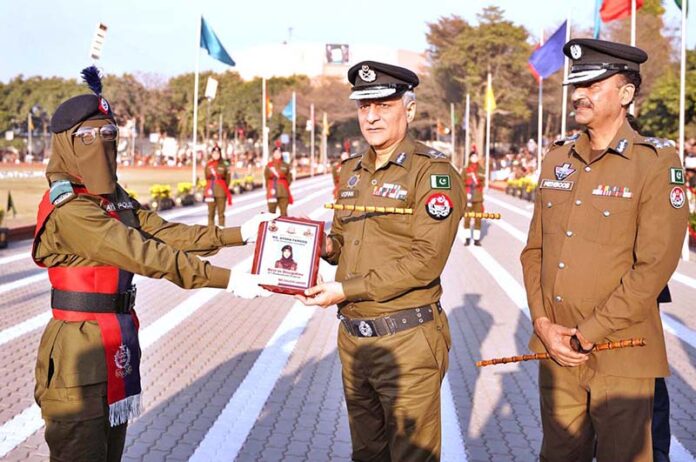 Inspector General of Police (IGP) Punjab Dr. Usman Anwar giving the souvenirs to the passing-out parade of the probationary officers during the passing out parade of 2nd Probationer Course at the Police Training College (PTC) Chung