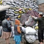 Vendor selling coal at Qainchee Road as the demand increases in winter season