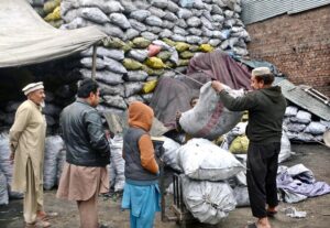 Vendor selling coal at Qainchee Road as the demand increases in winter season
