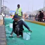 LDA workers are busy constructing separate green tracks for motorcycles and cycles at Ferozepur Road