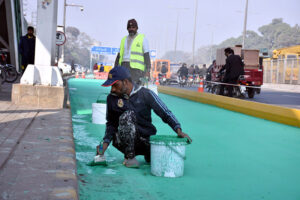 LDA workers are busy constructing separate green tracks for motorcycles and cycles at Ferozepur Road